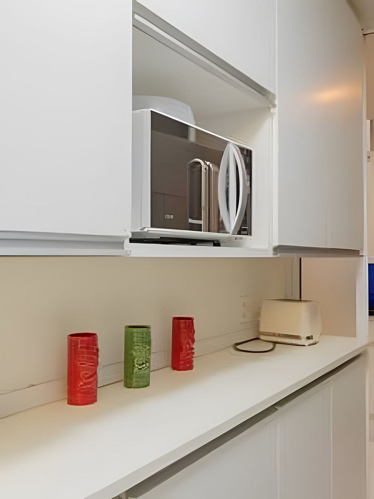 Apartamento confortável com garagem, a duas quadras da praia