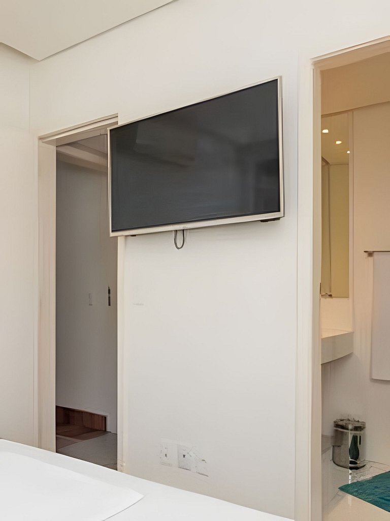 Apartamento confortável com garagem, a duas quadras da praia