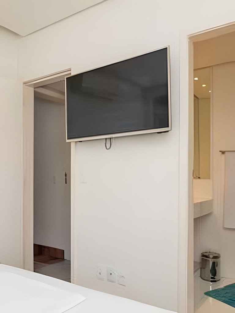 Apartamento confortável com garagem, a duas quadras da praia